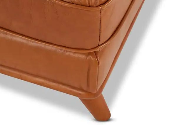 Baxter Leather Ottoman Leg Up Close