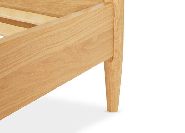 Erikson Upholstered Bed Queen Oak Up Close