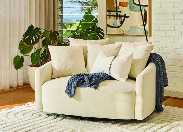 Snug Swivel Chair Ivory Fabric Up Style Shoot